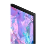 Rear view of the 65-inch display highlighting the thin profile and organized connectivity hub for hospitality management.