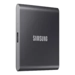 Front view of Samsung T7 1TB portable SSD in a vibrant Titan Grey metallic finish with a minimalist power indicator LED.