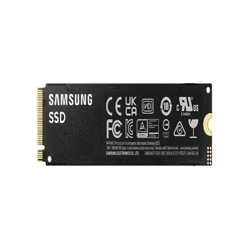 Underside of the 2TB NVMe SSD showing the copper heat dissipation layer and surface-mounted components.