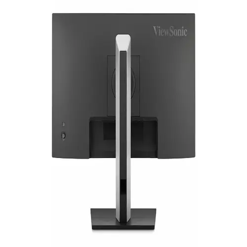 Rear view of the monitor showing an integrated carry handle at the top, a 4-port USB hub on the side, and a recessed panel for DisplayPort and VGA connections.