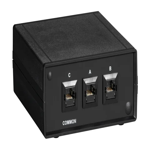 Black Box SW1030A fiber optic A/B switch back view with power input and optical switching mechanism