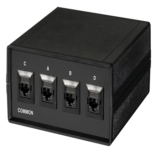 Black Box SW1031A fiber optic A/B switch back view with power input and optical switching mechanism